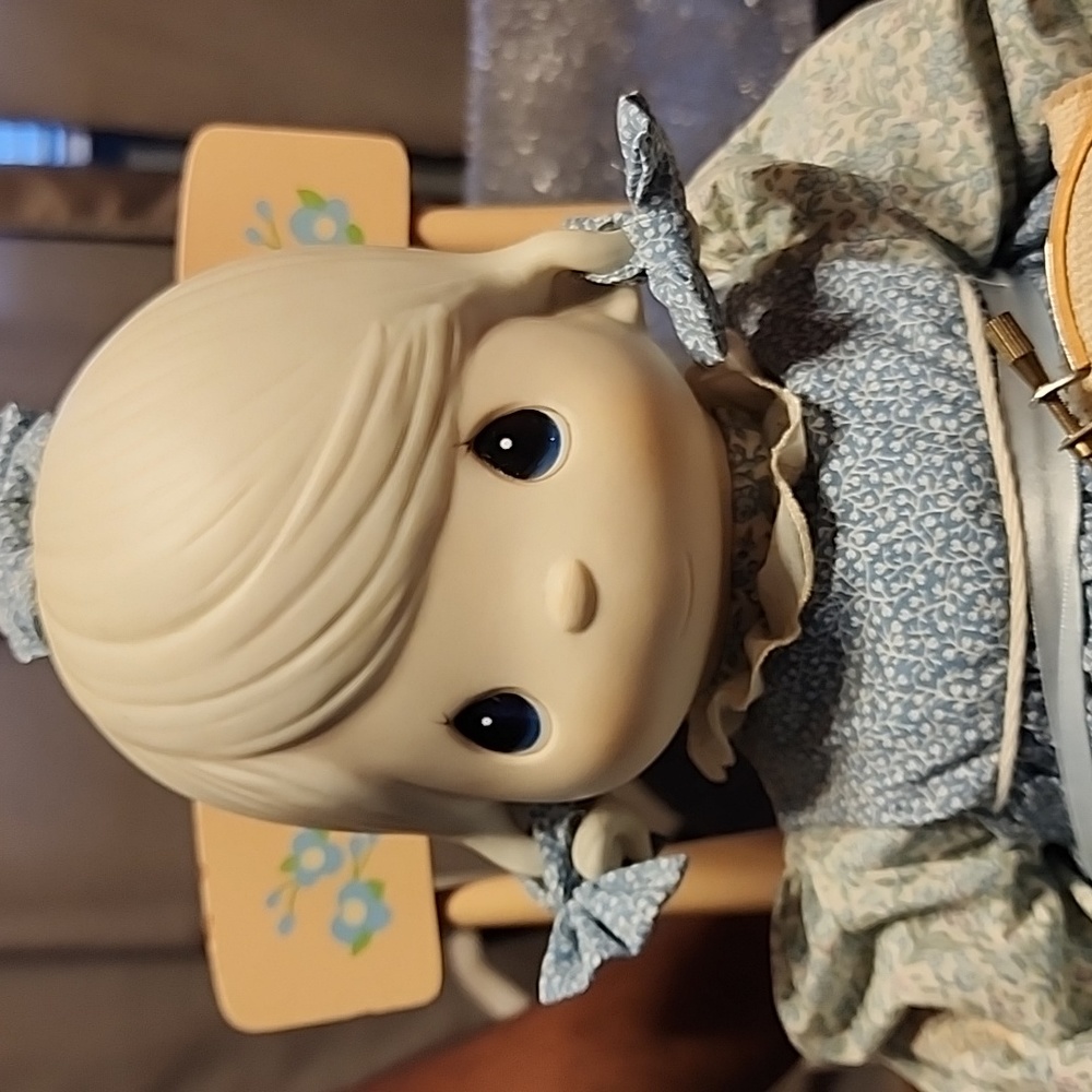 Porcelain Doll with Chair
